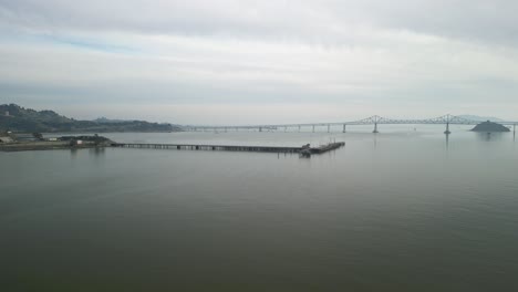 captivating drone footage of the richmond–san rafael bridge and the surrounding landscape of point molate.