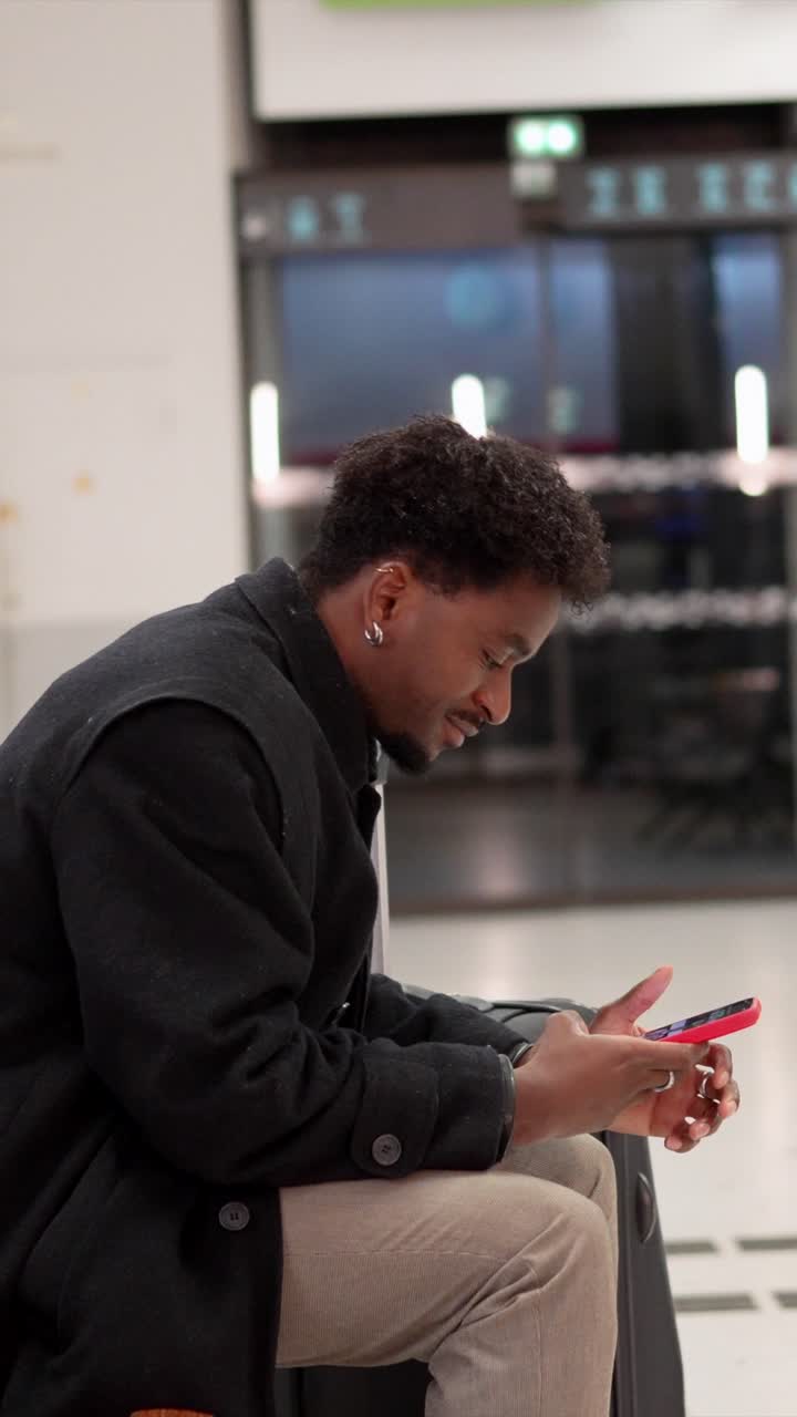 Man at Airport with Luggage