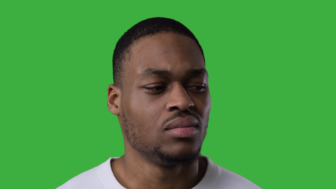 Depressed man over green background