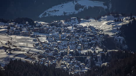 timelapse of traffic drvining in the austrian city badgastein in winter time