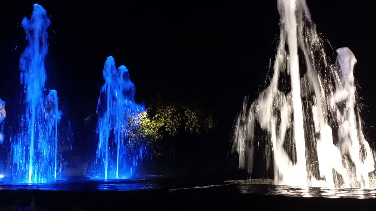 Luminous fountain with colorful water fountains