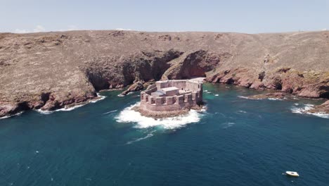 Aerial-view-of-Fort-of-the-Berlengas,-barren-island-landscape-in-background