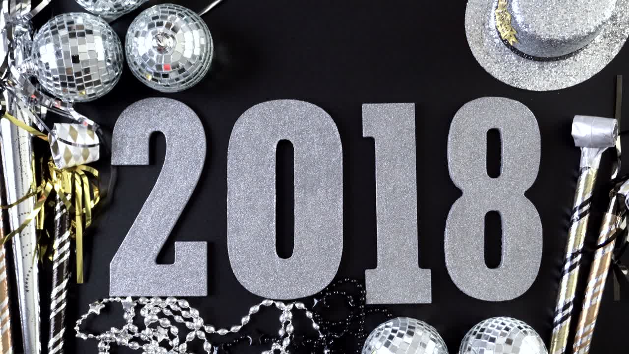 Silver numbers of 2018 Year on a black background.