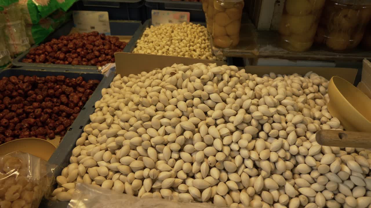 Asian ginkgo nuts at street market booth documentary