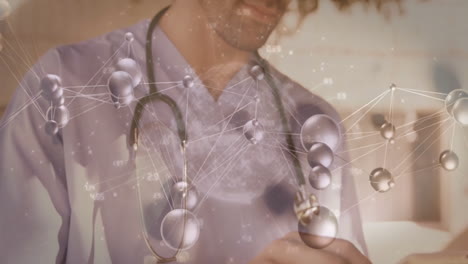 doctor tapping tablet with stethoscope while digital molecules and network lines floating over desk