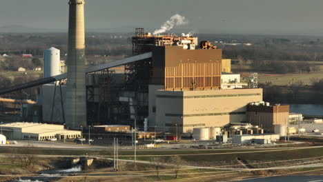 sunset glow on flint creek power plant by lake swepco, arkansas, clear sky, industrial scene