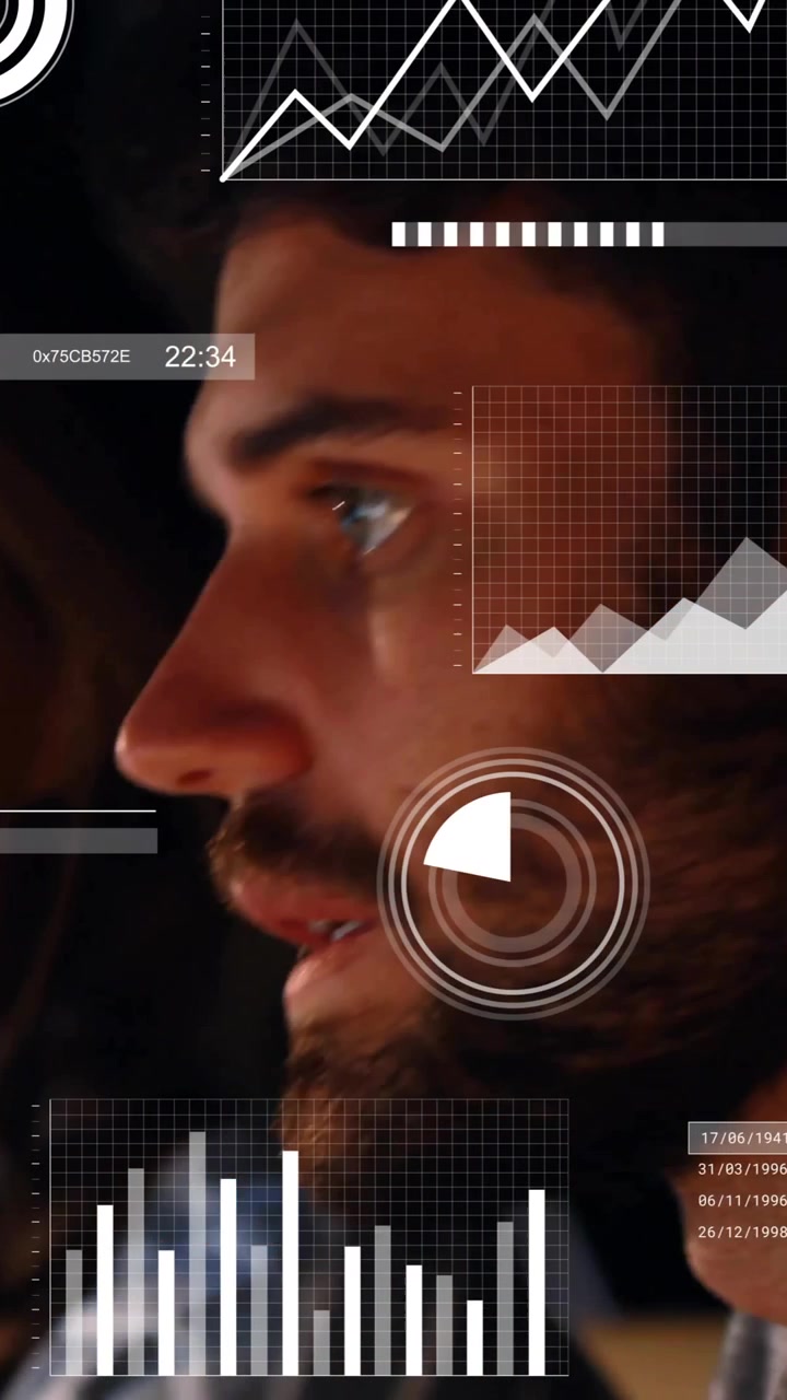 Animation of infographic interface over caucasian colleagues discussing in office at night