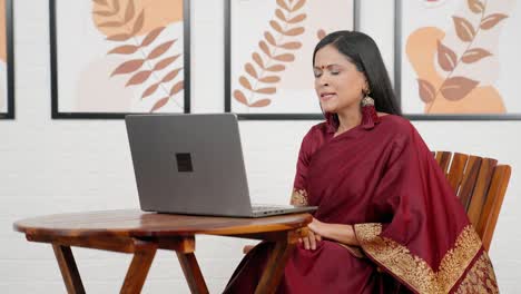 indian female employ on video call meeting