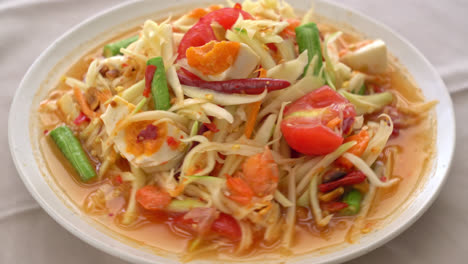 Som-Tum---Thai-Spicy-green-papaya-salad-with-salty-eggs---Asian-food-style