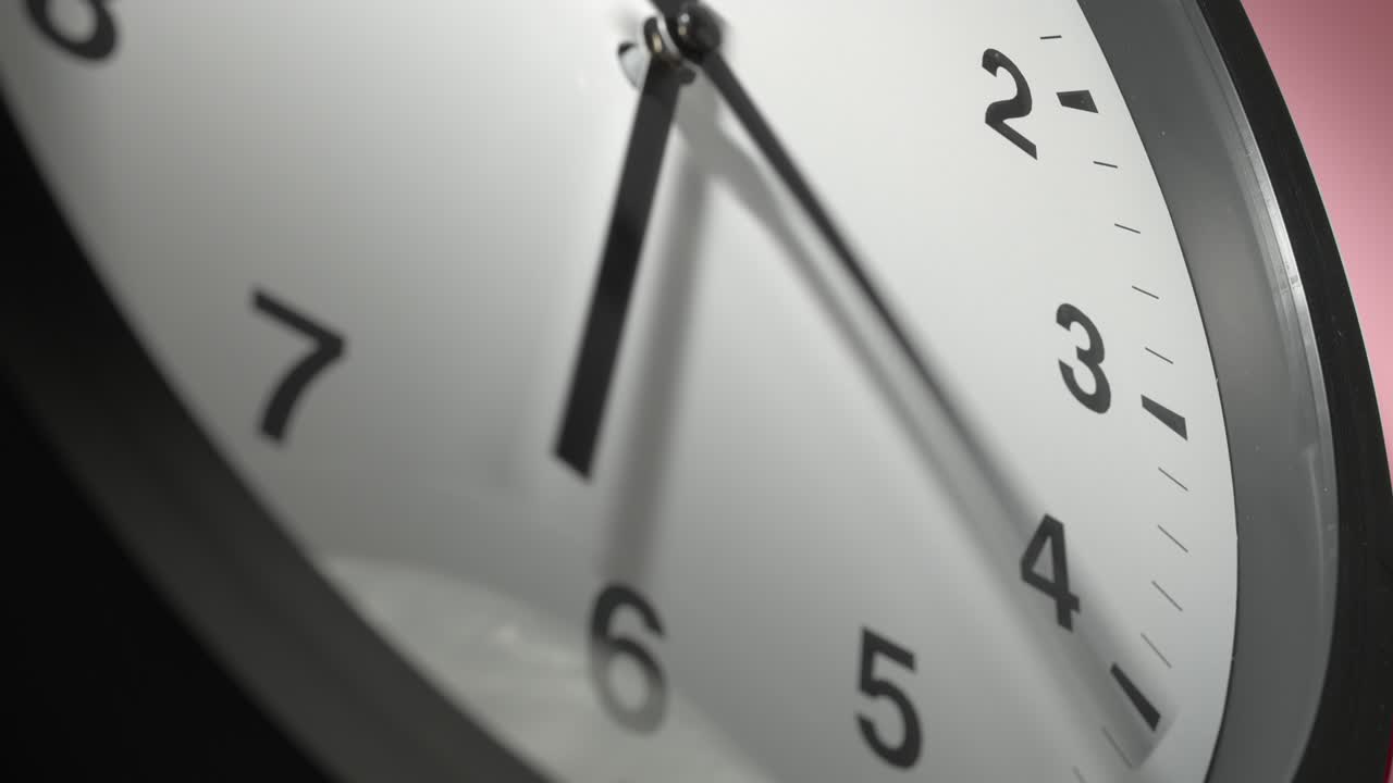 Clock Face on Rosy Rose Pink Wall in Time Lapse