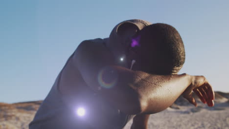 animation of glowing lights over a running african american man