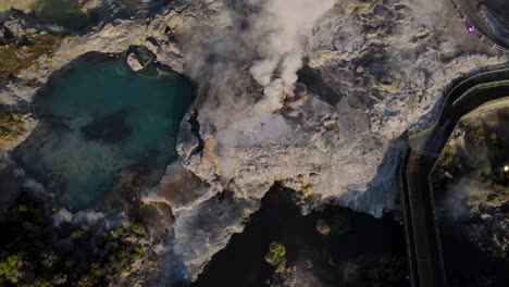 amazing tilt up reveal of pohutu geyser - the largest in new zealand