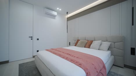 cozy bedroom detail with stylish textured pillows