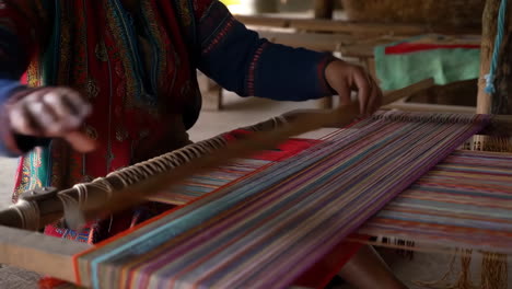 weaving textile art on a handloom