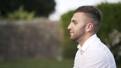 man outdoors in profile view