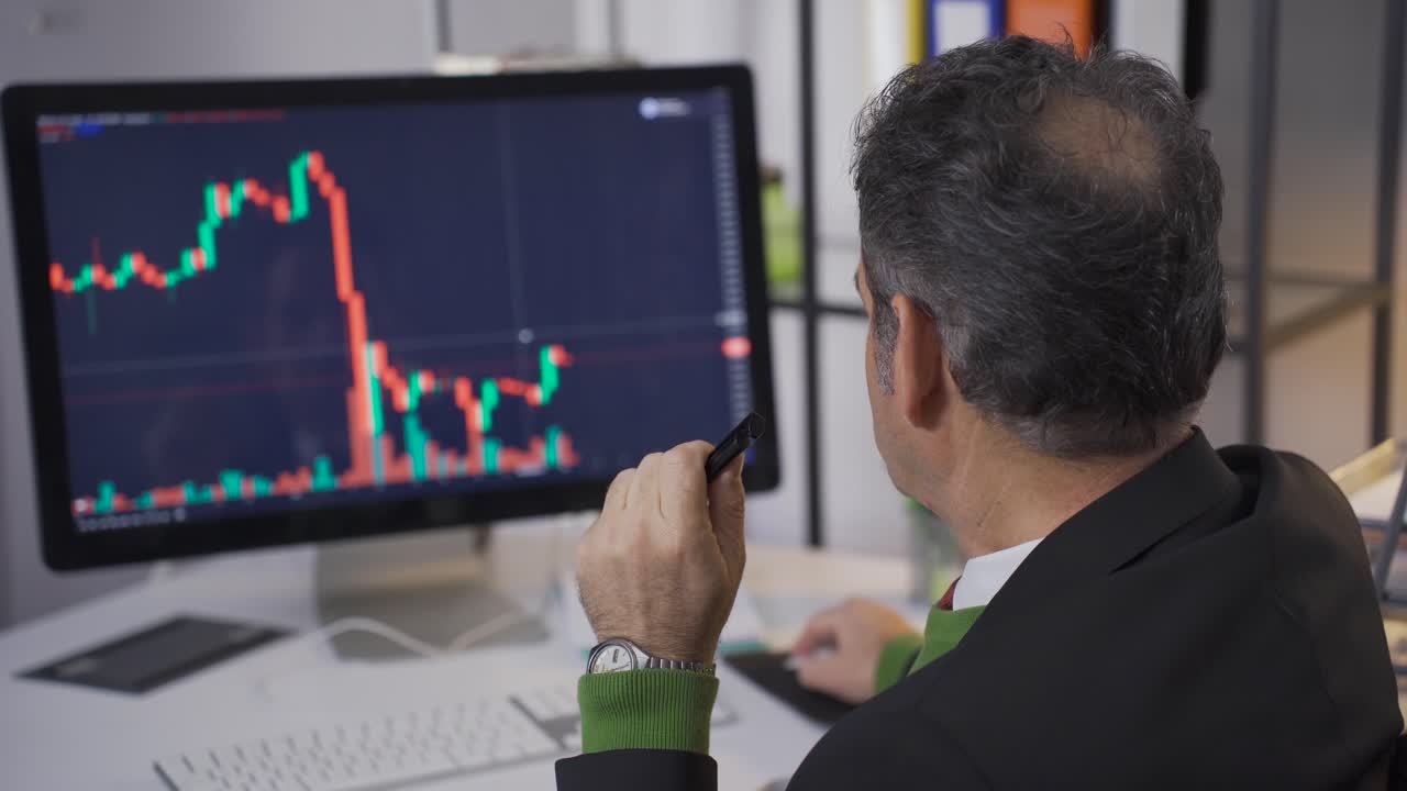Businessman searching and analyzing stock market data.