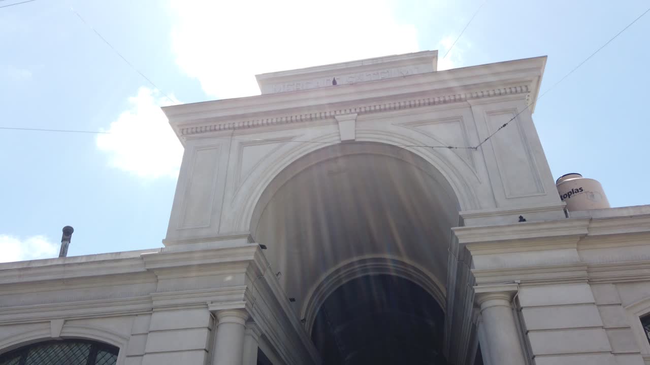 Establishing shot at colonial San Telmo antique Market, Buenos Aires city Landmark, traditional Argentine travel destination