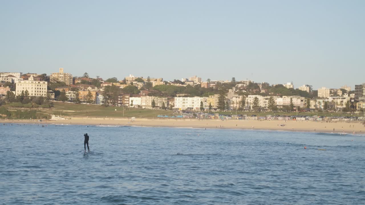 Man on Paddleboard North Bondi Beach in New South Wales, Australia