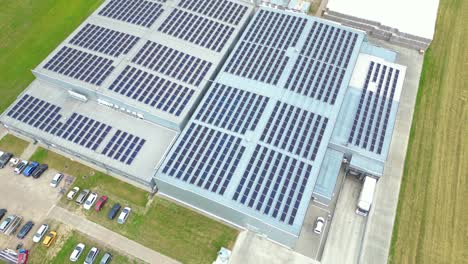 Aerial-view-of-modern-storage-warehouse-with-solar-panels-on-the-roof