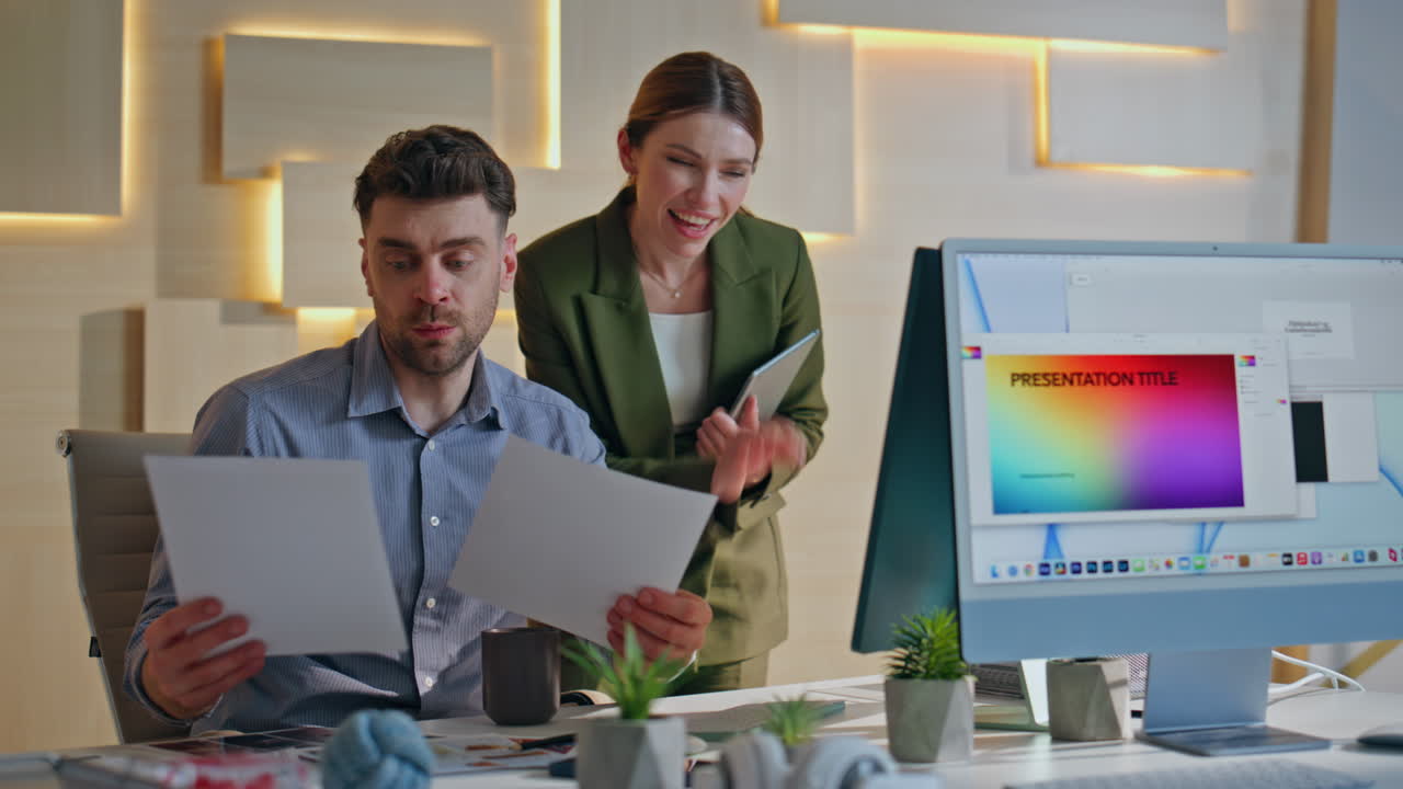 Successful colleagues talking virtual meeting by computer web camera in office