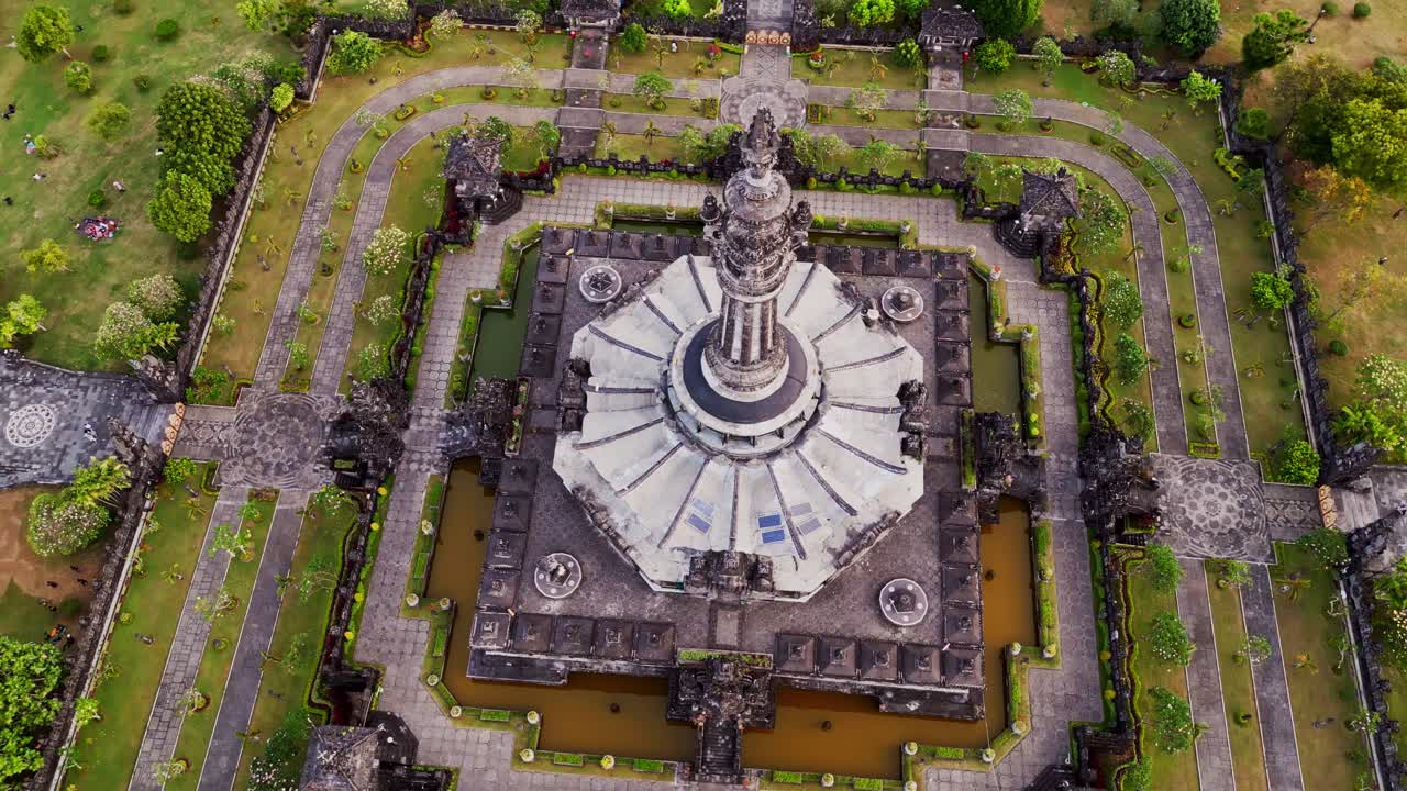 Aerial footage of the Bajra Sandhi Monument in Renon, Bali, shows its grand architecture rising above the surrounding gardens, reflecting the spirit of Balinese culture and national pride