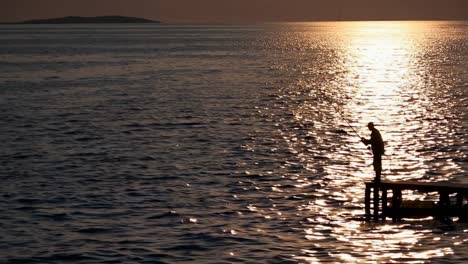 fisherman at sunset