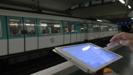 girl with touch pad in underground