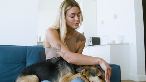 woman and dog at home