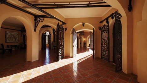 luxurious mediterranean-style mansion interior with grand arches and sunlit spaces