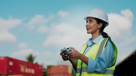 woman drone operator at container terminal