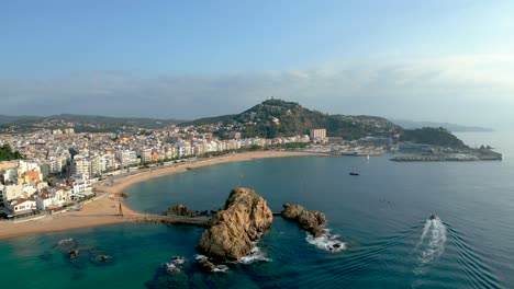 aerial image with drone of the bay of blanes on the costa brava, wide-angle shot of the main and port