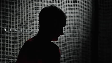 silhouette of a man in a sport setting