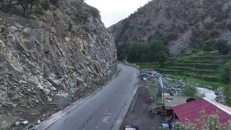 curving mountain road along chilas-babusar, pakistan. aerial