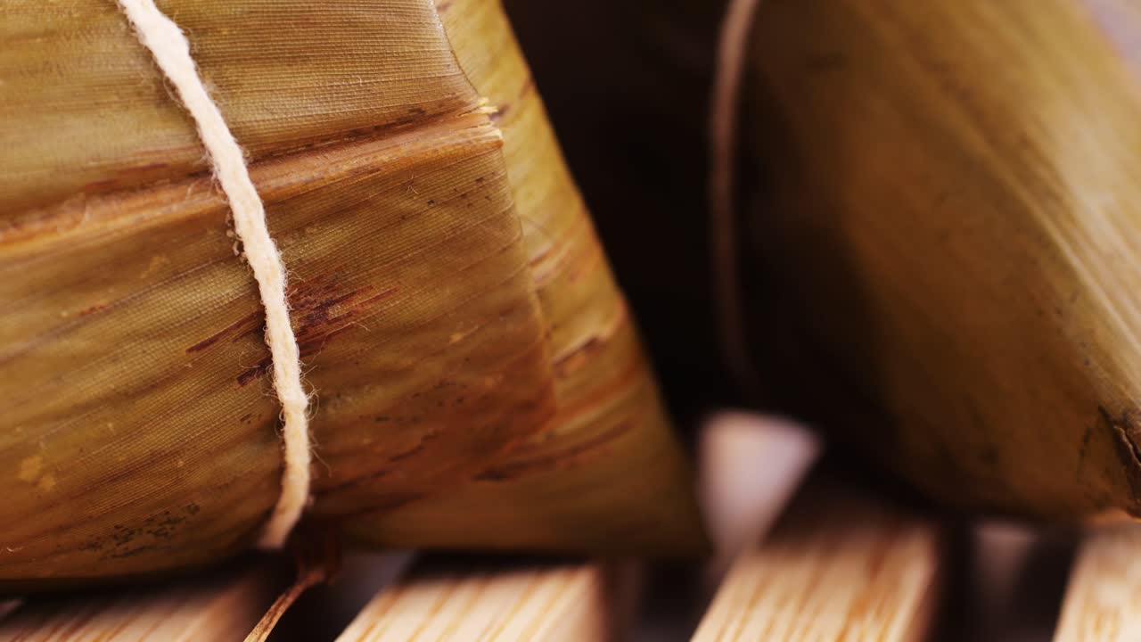 Close-up of Zongzi (Rice Dumplings) in Bamboo Steamer