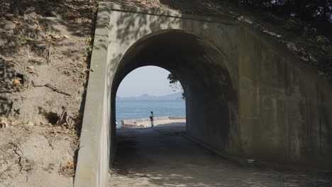 tunnel leading to inland sea of japan from okunoshima, hiroshima japan