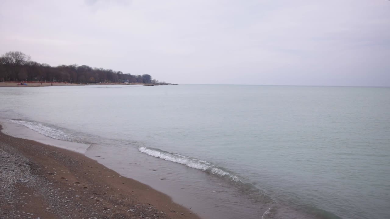 Beautiful Waves Breaking Gently On The Beach In Canada - Close Up Shot