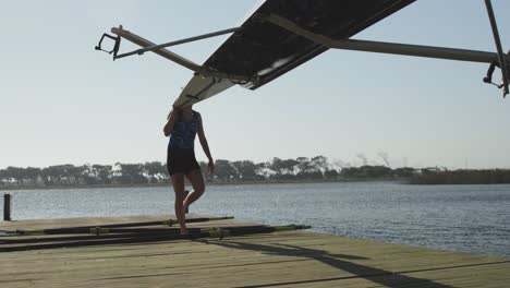 female rowing team training on a river