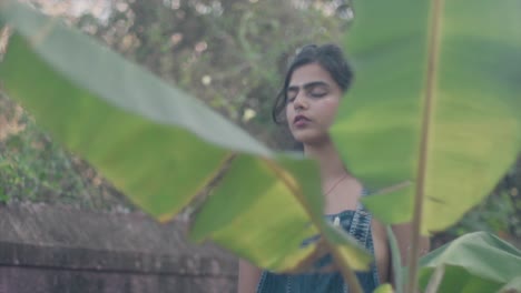 Beautiful-Asian-girl-focusing,meditating-in-the-nature