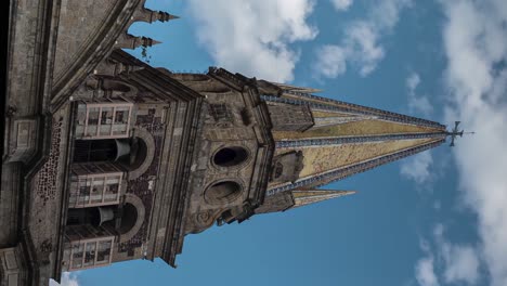 Church-spire-with-bells-on-top-of-Guadalajara-Cathedral-in-Mexico,-close-up-detail