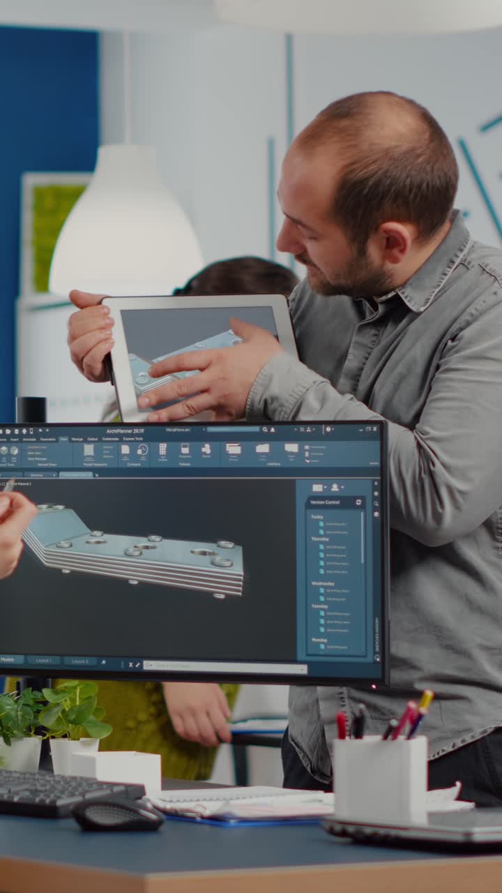 Vertical video Team of architects and engineers working on building prototype project