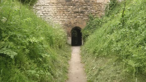 slow motion approaching a door in old castle