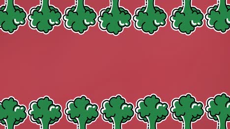 Animation-of-broccoli-icons-over-red-background