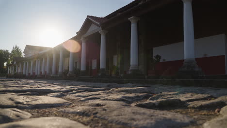 ancient roman colonnade in sunlight
