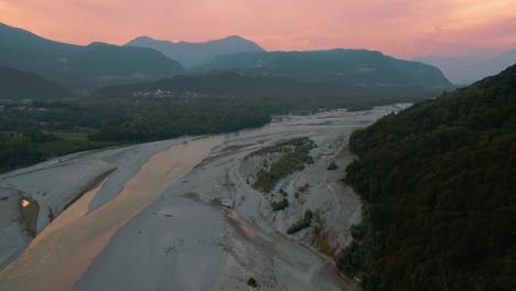 Sunset-at-Tagliamento,-the-last-natural-flowing-river-in-the-alps-with-a-wide-riverbed-in-Italy