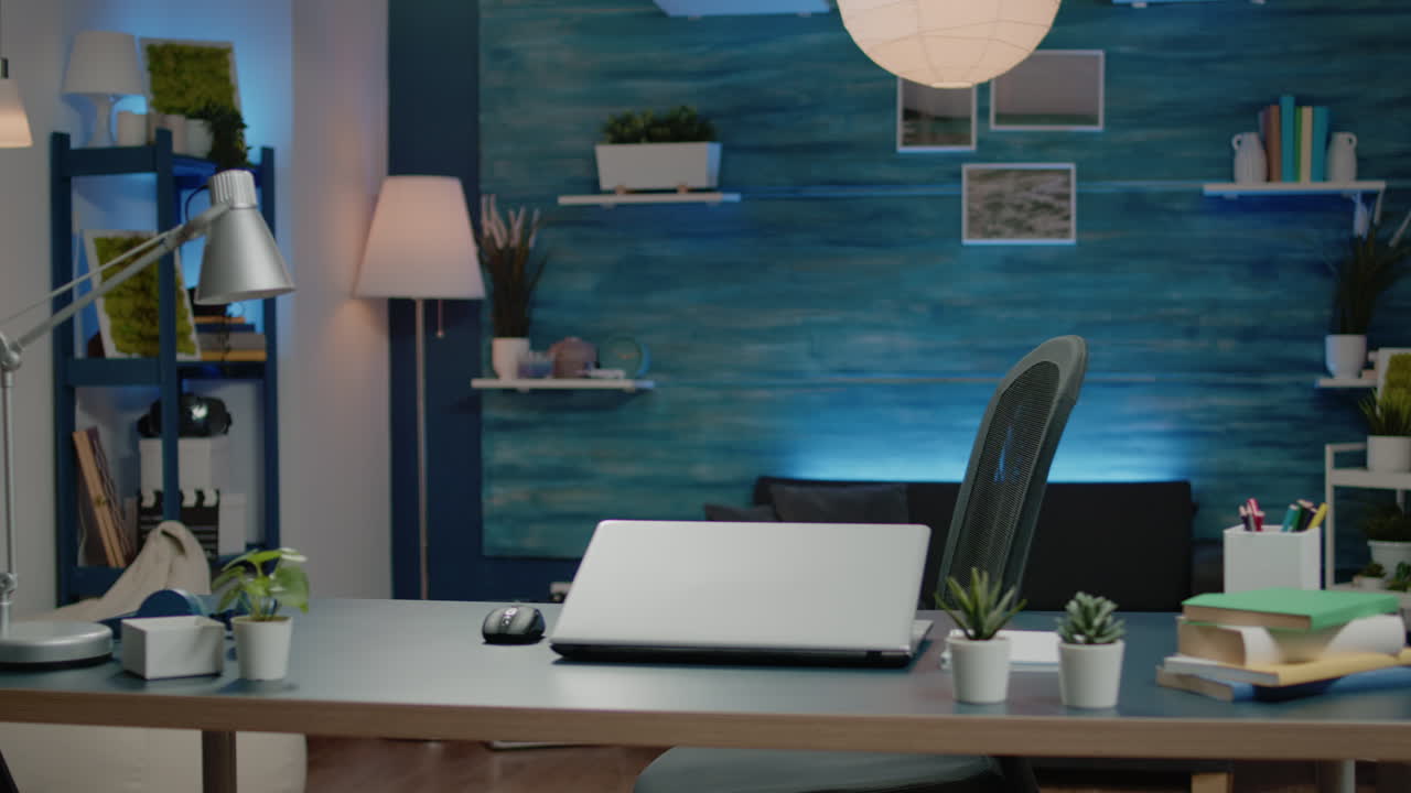 Young entrepreneur using laptop for remote online business work