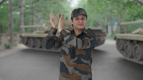 happy indian army man clapping and appreciating