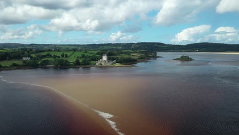 aerial view of doe castle, donegal county, ireland on a picturesque coastline of sheephaven bay