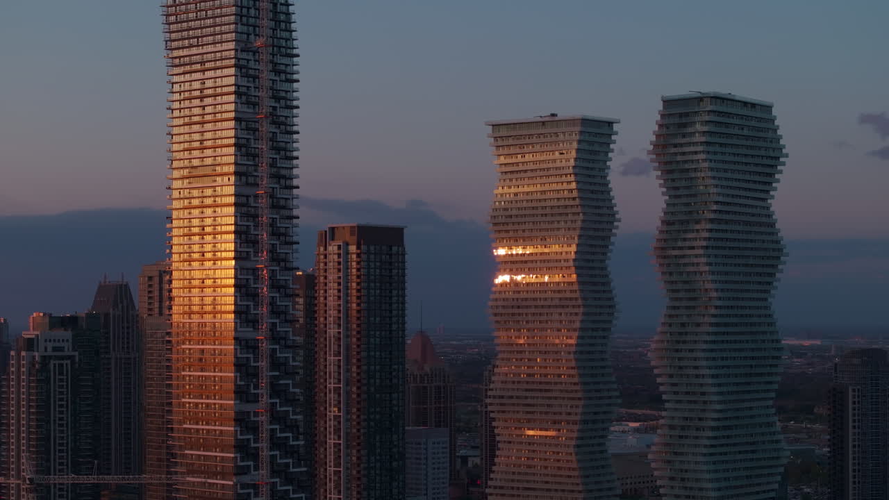 Drone shot of M City Condos at sunset in Mississauga skyline