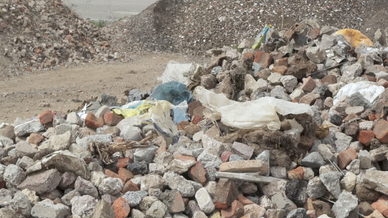 Piles of rubble in an aggregate site with falling rocks