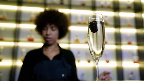 bartender serving champagne